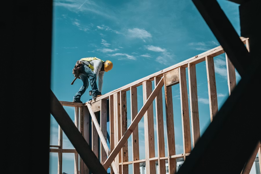 Construction professional reviewing work on site
